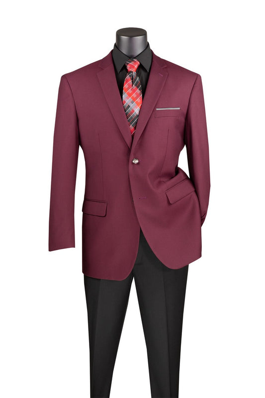A mannequin displays the Vinci Suits "Regular Fit 2 Button Blazer (Burgundy) B-TR," highlighted by its sophisticated notch lapel, elegantly paired with a black dress shirt, multicolored tie, and sleek black pants.