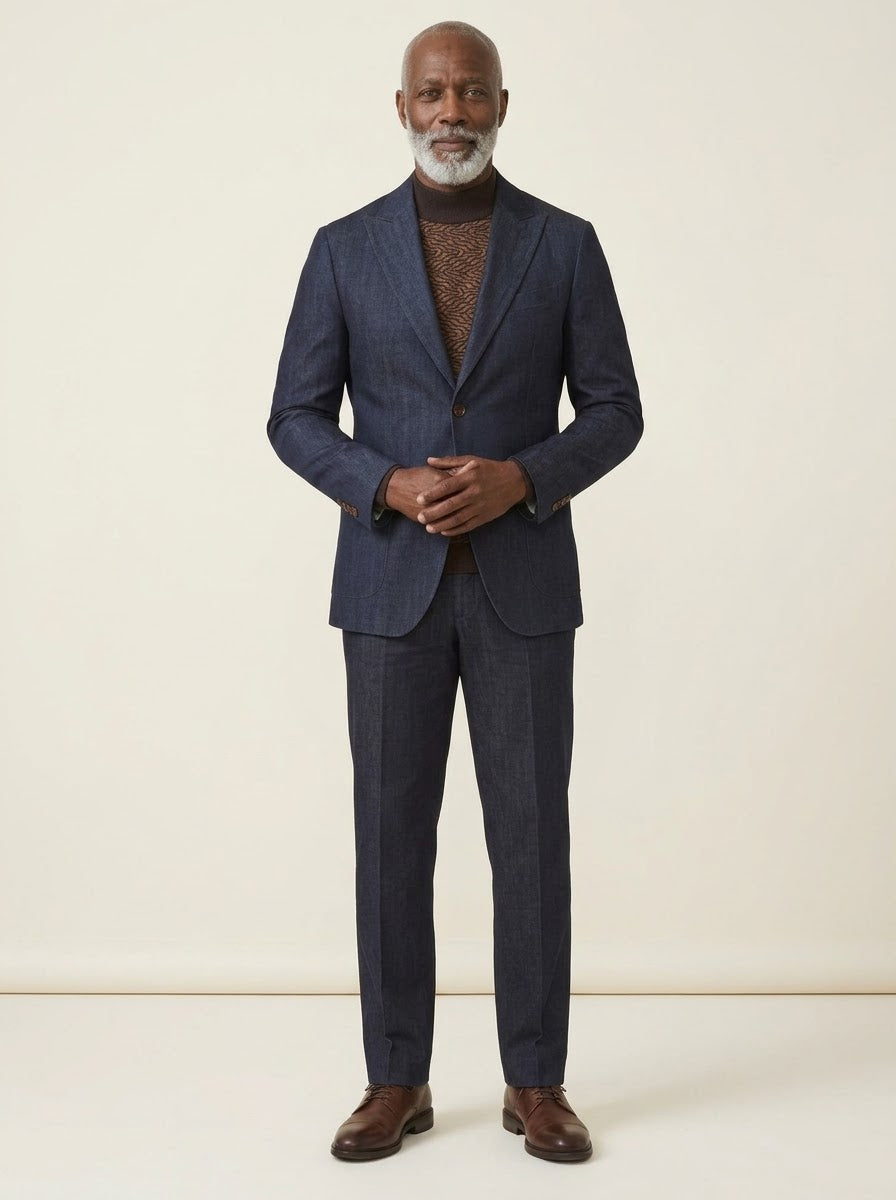 A man with short gray hair and a beard stands facing forward, wearing the Inserch Denim 2pc Suit SU660281-00195 Indigo, brown shoes, and a brown patterned shirt.