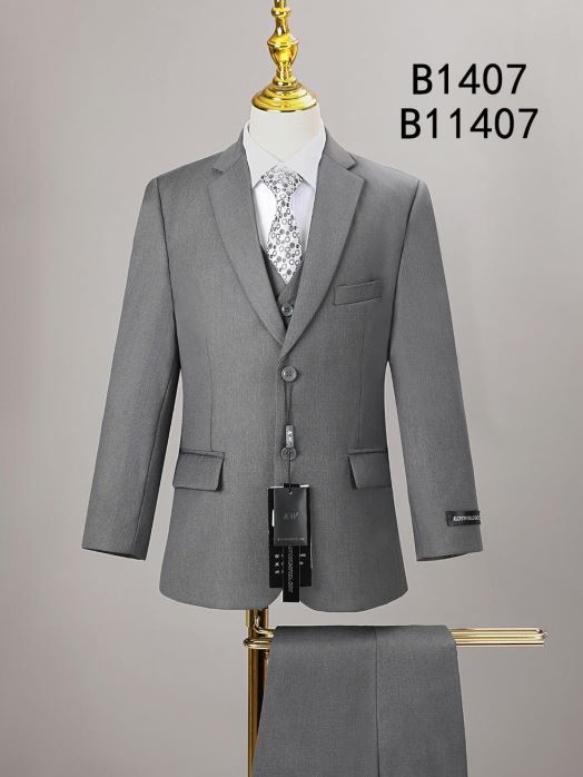 A light gray BOY SUIT 5-PC SET B1407 by Unique Design Menswear features a three-piece suit and patterned tie, shown on a mannequin with matching pants draped below—an elegant choice in boys' formal wear.