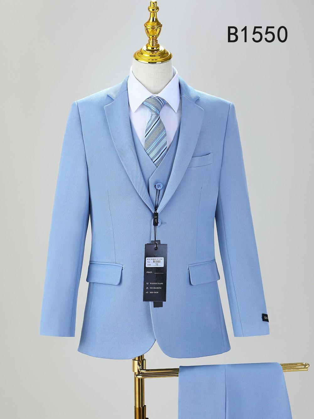 The BOY SUIT 5-PC SET B1550 by Unique Design Menswear, shown on a mannequin, features a light blue formal suit with notch lapel, white shirt, striped blue tie, and black tag. Product code "B1550" is displayed in the upper right.
