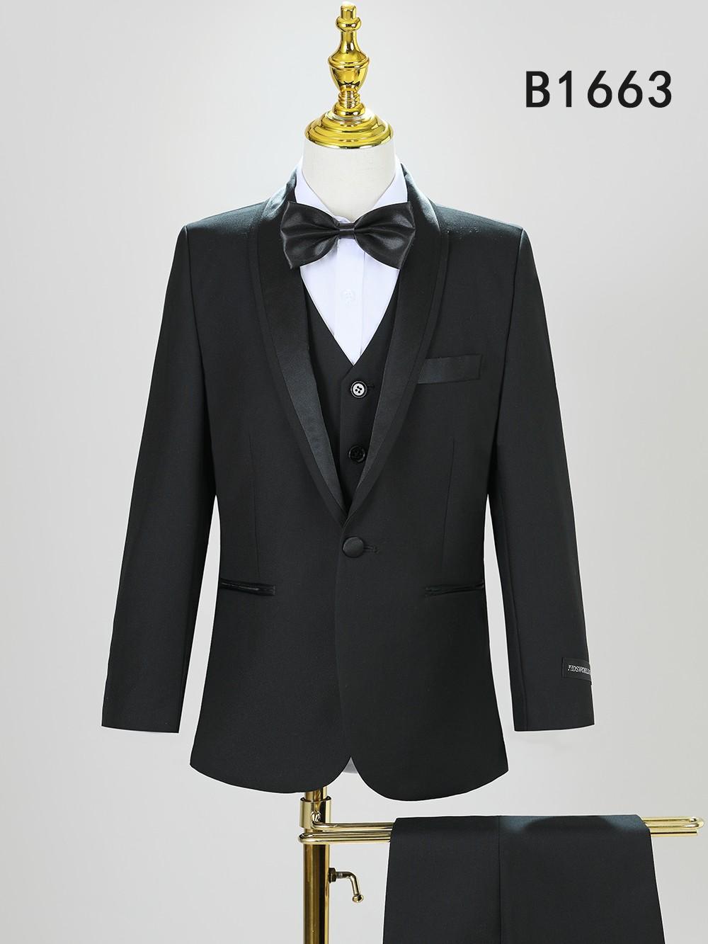 The Unique Design Menswear BOY SUIT 5-PC SET B1663 features a black suit with satin lapels, black bow tie, white shirt, and matching trousers, displayed on a mannequin. "B1663" appears in the top right corner.