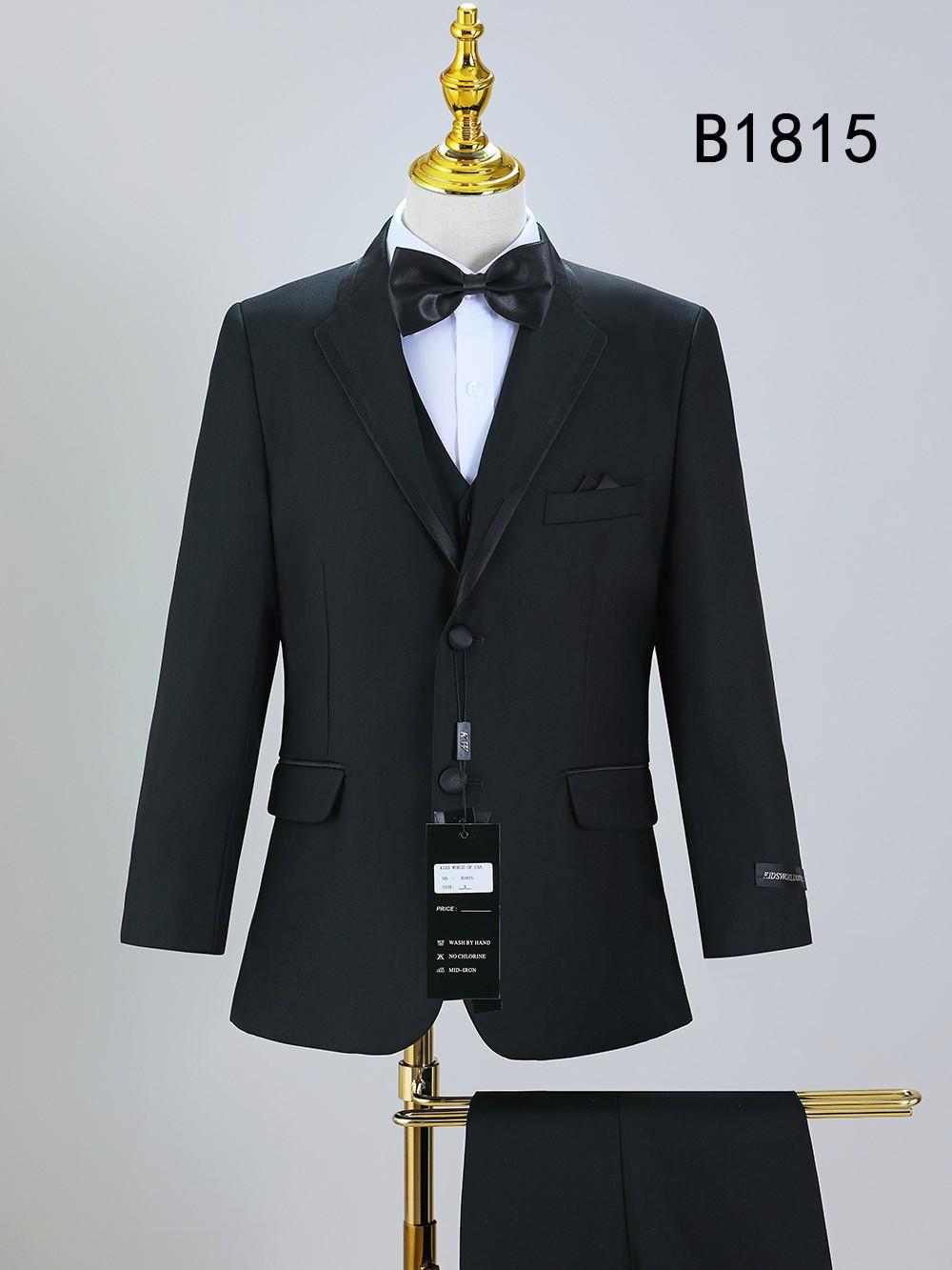 A boys' five-piece suit set (BOY SUIT 5-PC SET B1815) by Unique Design Menswear is showcased on a mannequin against a plain background, making it perfect for special occasions.