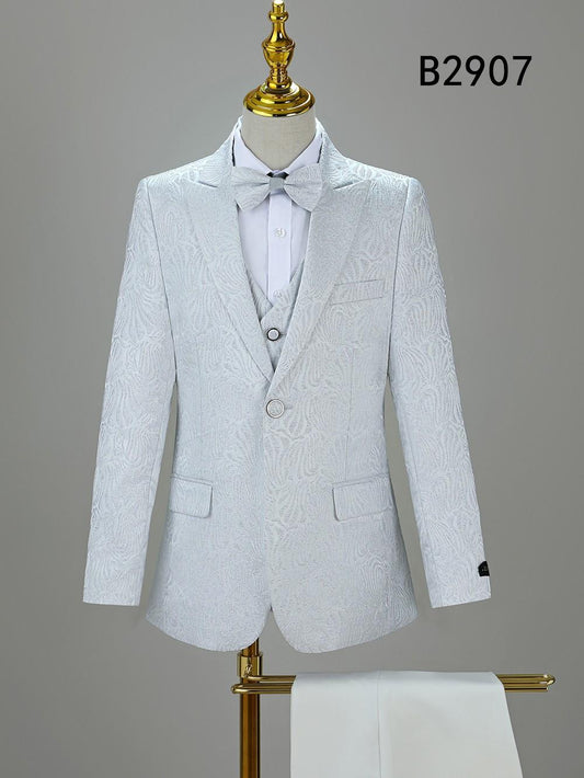 The BOY SUIT 5-PC SET B2907 by Unique Design Menswear, featuring a white textured suit with matching vest, dress shirt, and bow tie, is displayed on a mannequin with code B2907 shown in the top right corner.