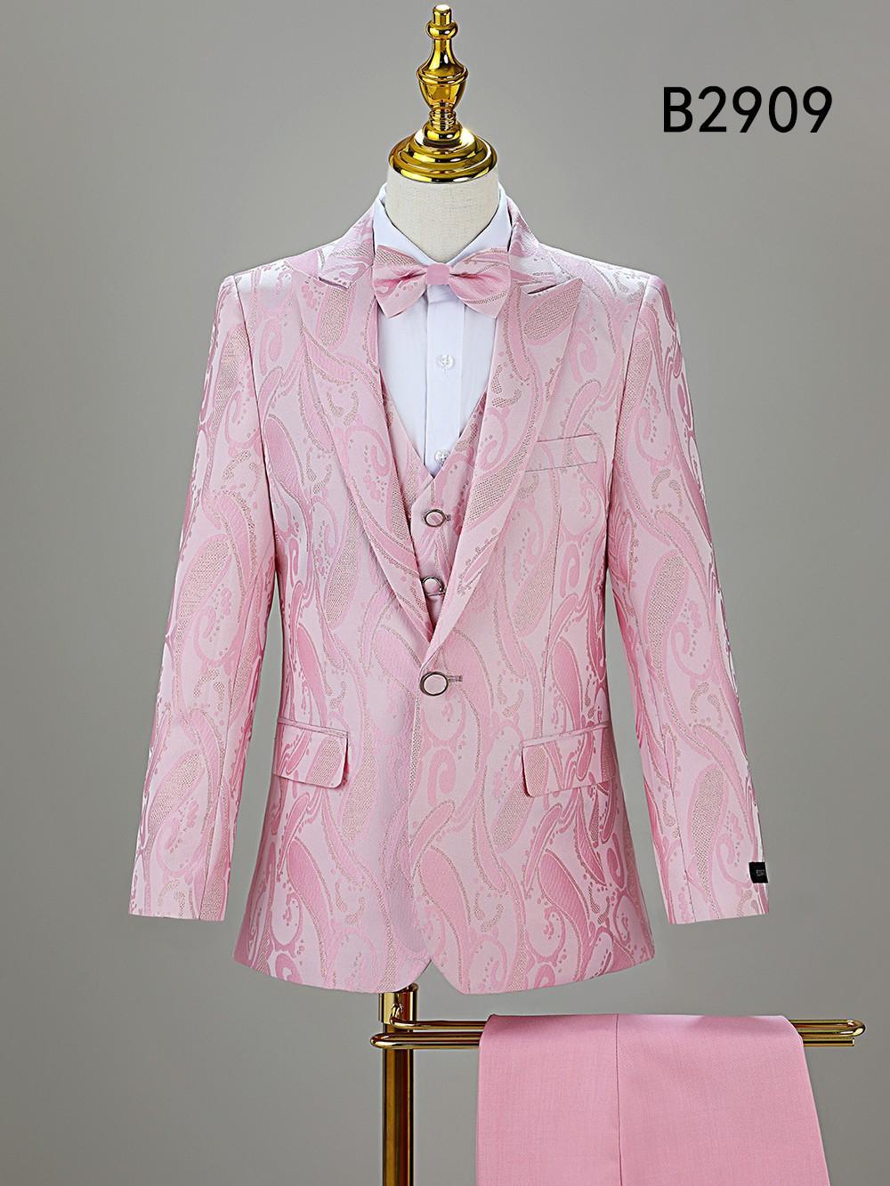 The Unique Design Menswear BOY SUIT 5-PC SET B2909 features a light pink paisley-patterned suit with a matching bow tie and trousers, shown on a mannequin against a plain background—a stylish formal outfit for boys.