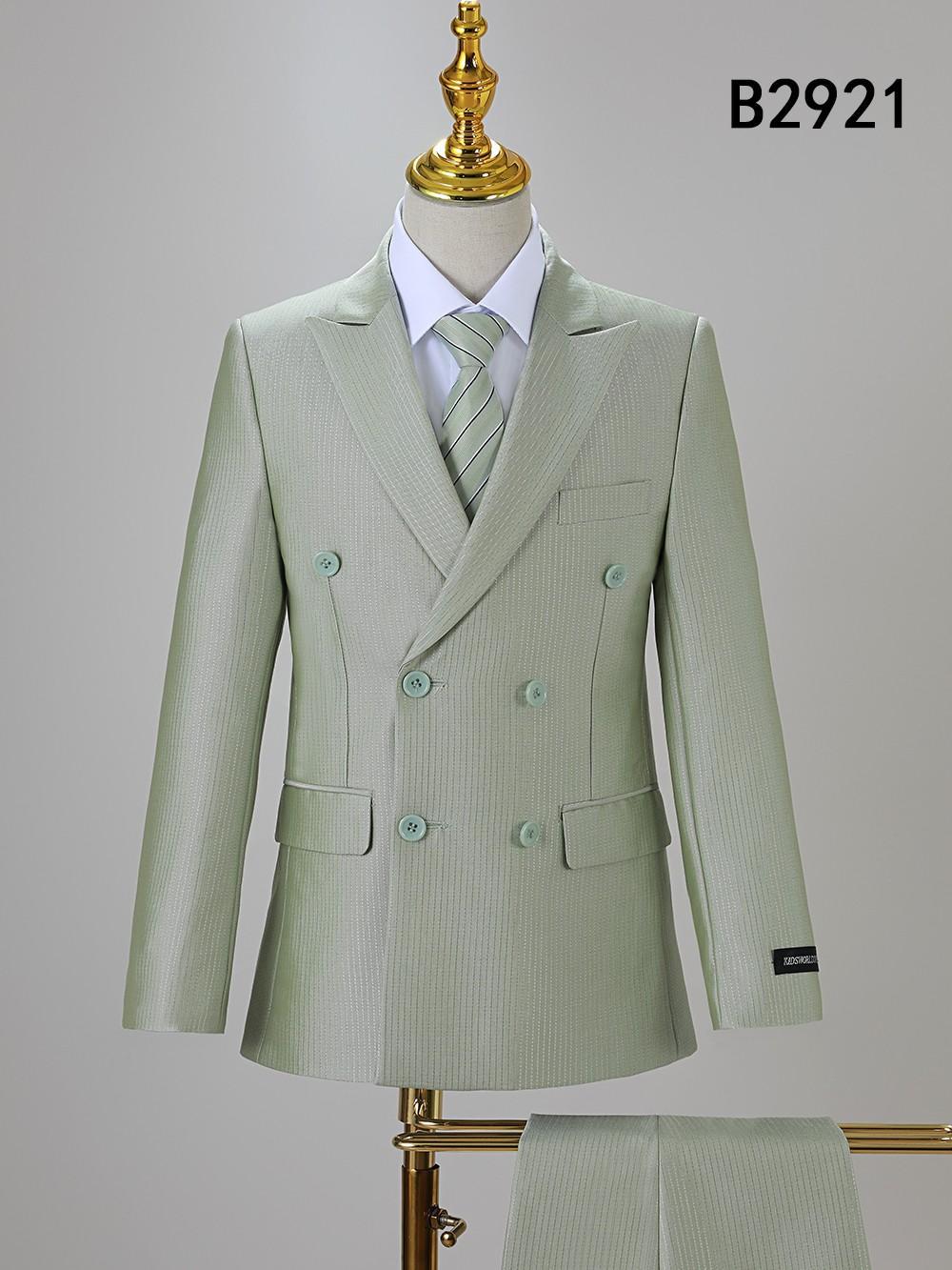 The BOY SUIT 5-PC SET B2921 by Unique Design Menswear features a light green double-breasted suit, matching trousers, white shirt, and striped tie on display—a stylish formal look for special occasions. Code "B2921" shown top right.