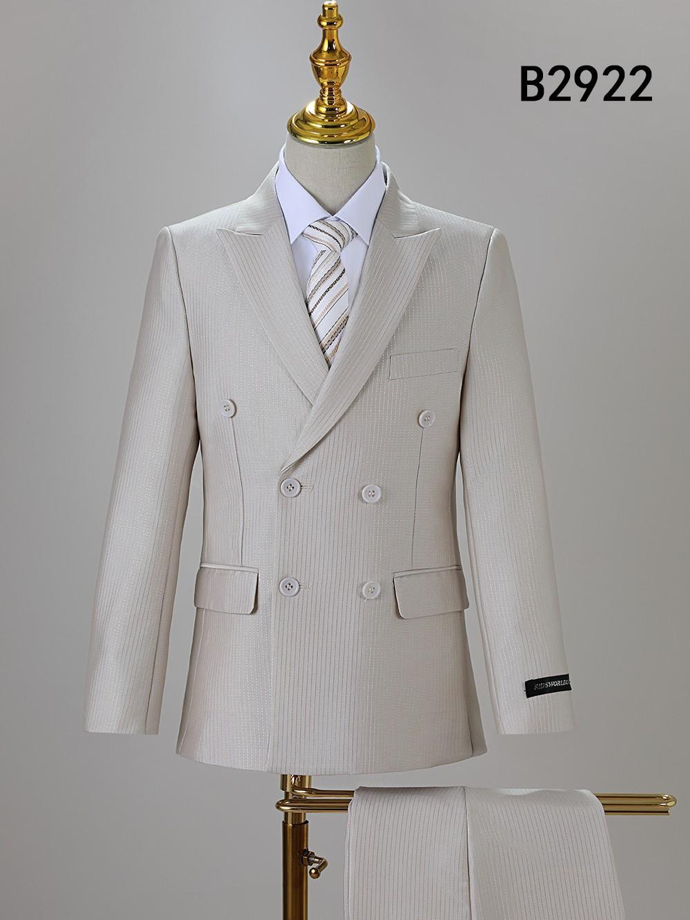 The Unique Design Menswear BOY SUIT 5-PC SET B2922 features a beige double-breasted suit with matching trousers, white shirt, and striped tie—styled on a mannequin, ideal boys' formal wear for special occasions. Model B2922 shown top right.