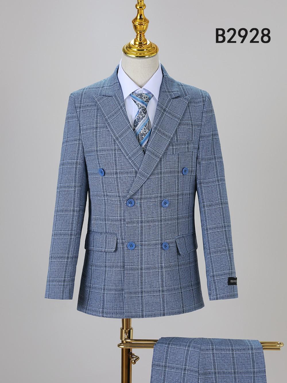 The Unique Design Menswear BOY SUIT 5-PC SET B2928 features a blue plaid double-breasted jacket, matching trousers, vest, white shirt, and patterned tie—a polished boys outfit displayed on a mannequin.