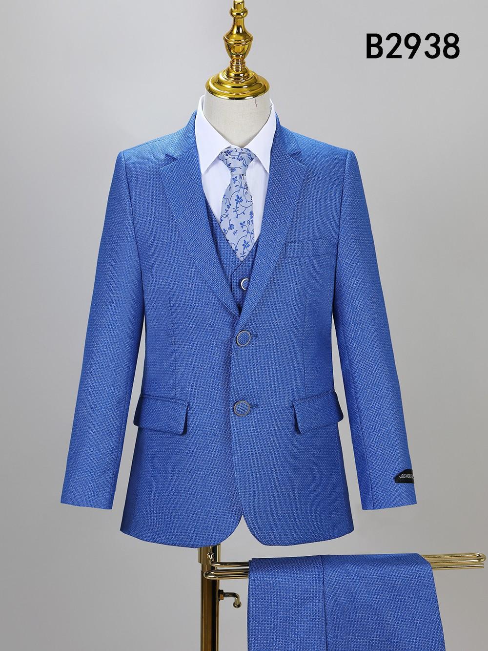 A blue BOY SUIT 5-PC SET B2938 by Unique Design Menswear, featuring a floral-patterned tie, jacket, vest, and pants, is displayed on a mannequin with code "B2938" in the top right corner.