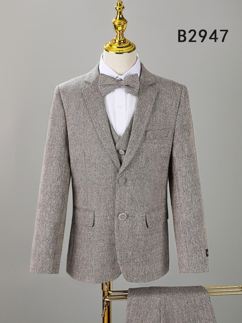 The BOY SUIT 5-PC SET B2947 by Unique Design Menswear is a child-sized grey textured suit with jacket, pants, vest, and matching bow tie, displayed on a mannequin.