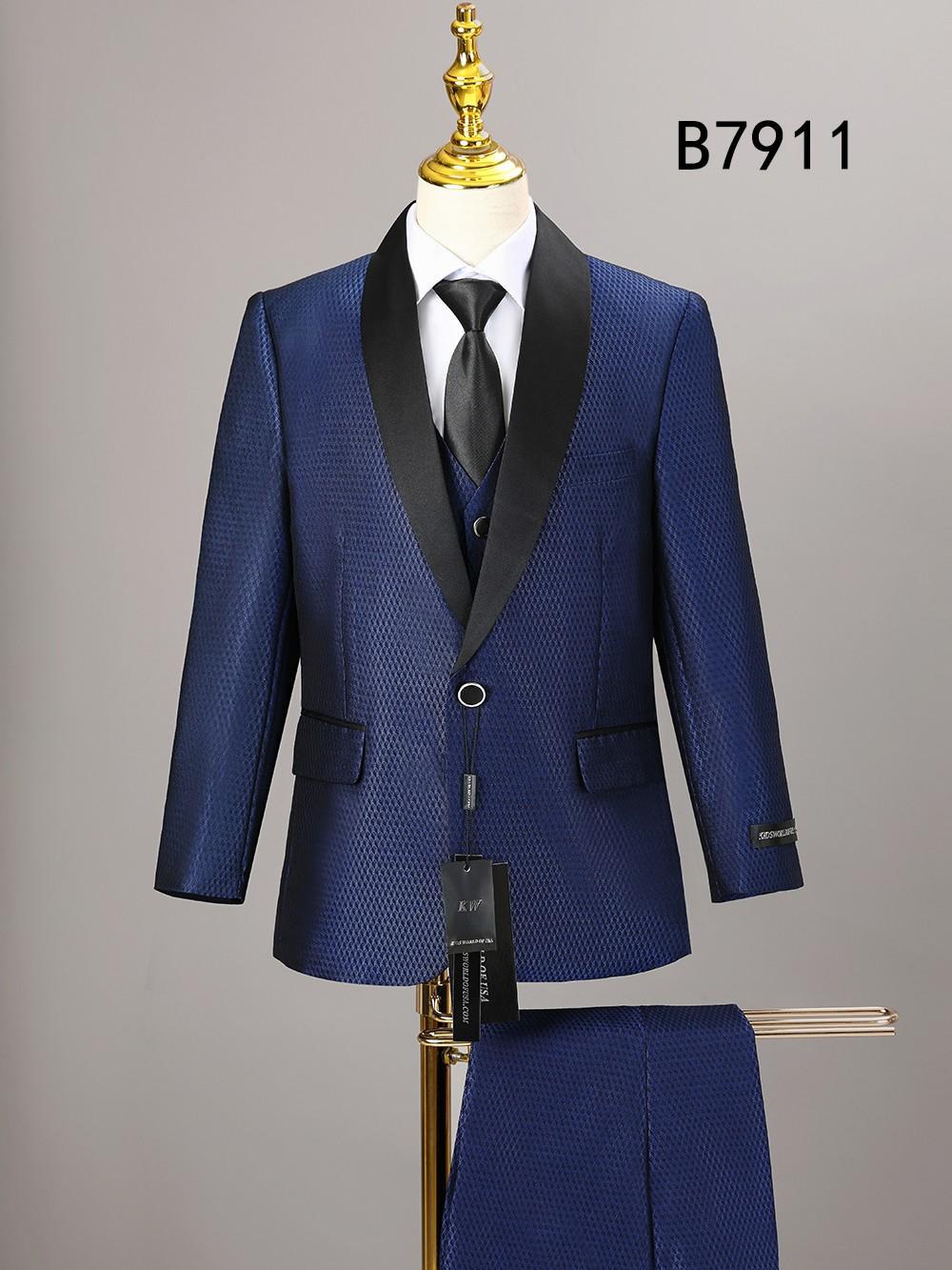 The BOY SUIT 5-PC SET B7911 by Unique Design Menswear features a blue textured suit with black satin lapels, tie, white shirt, and matching trousers—perfect formal wear for boys. Style B7911 tag is visible on the mannequin.