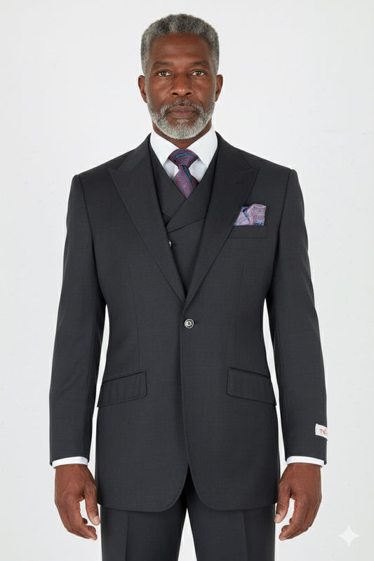 A mannequin dressed in the Tiglio Rosso San Giovesse Charcoal Grey TIG1008 suit, featuring a white shirt, a patterned tie, and a matching pocket square.