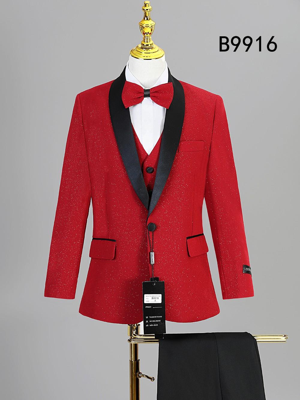 The BOY SUIT 5-PC SET B9916 by Unique Design Menswear features a red jacket with black satin lapels, red waistcoat, bow tie, and black trousers. Shown on a mannequin in the top right corner; this formal set is perfect for special occasions.