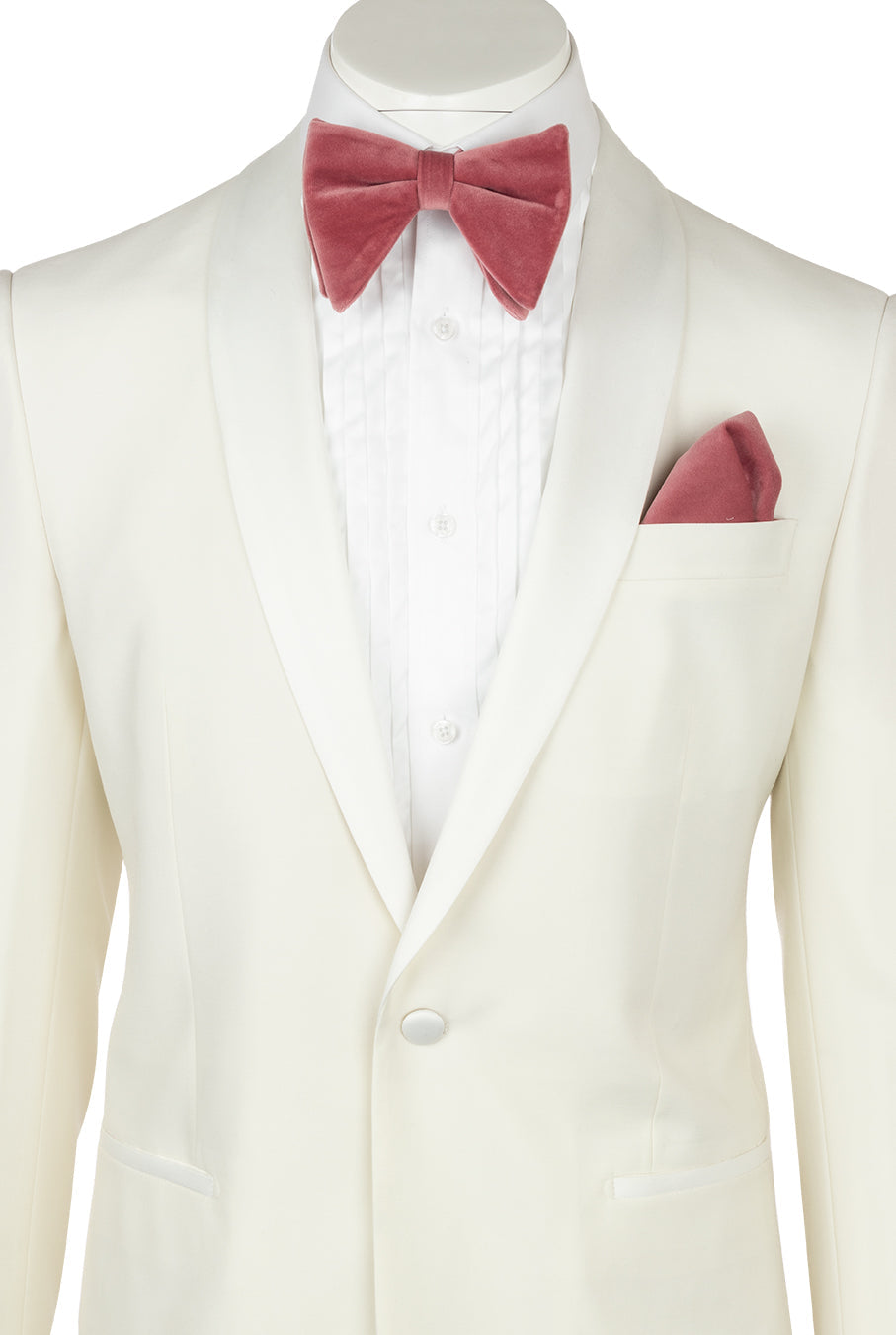 The Tiglio Luxe Beckham Modern Fit Off White Pure Wool Tuxedo from Tiglio Luxe, featuring satin lapels and crafted from luxury Italian fabric, is paired with a white dress shirt, a pink velvet bow tie, and a matching pink pocket square—all presented on a headless mannequin.