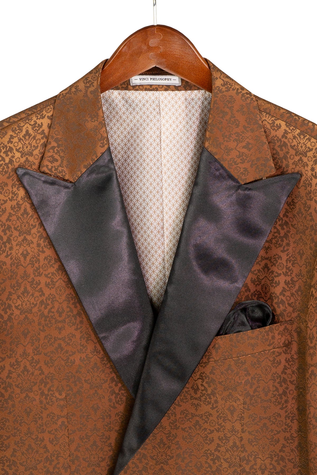 Mannequin dressed in Vinci Suits Regular Fit Brown Floral Jacquard Peak Lapel Blazer BF-9 with white shirt, black bow tie, and black trousers.