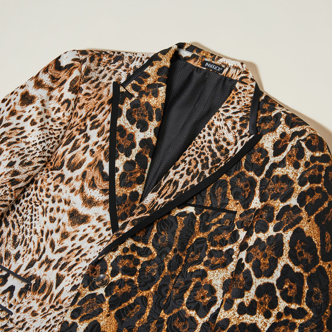 The Inserch Animal Print Blazer BL200-25 Brown by Inserch features a slim fit, leopard print in black, brown, and tan, black lapels, and multiple pockets, shown laid flat against a light background.