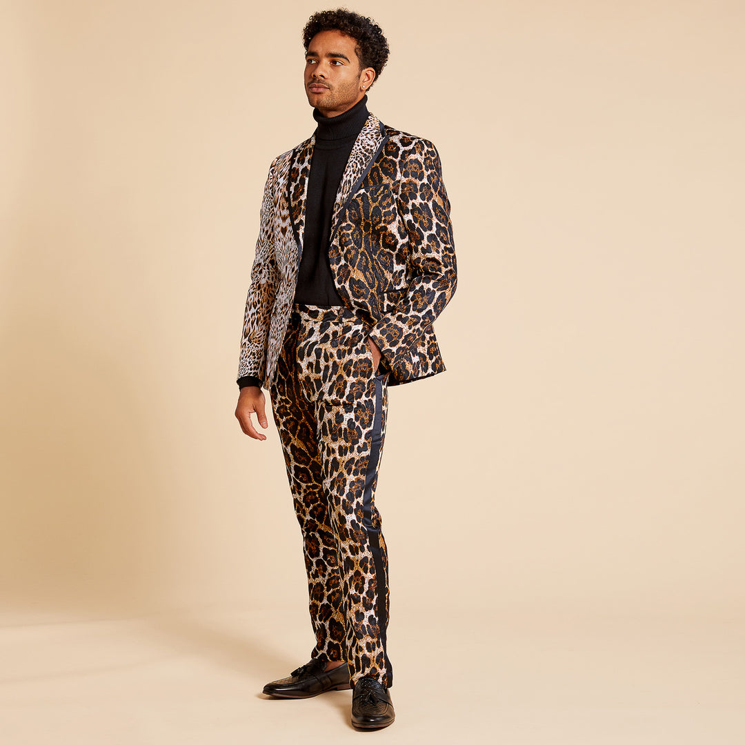 The Inserch Animal Print Blazer BL200-25 Brown by Inserch features a slim fit, leopard print in black, brown, and tan, black lapels, and multiple pockets, shown laid flat against a light background.