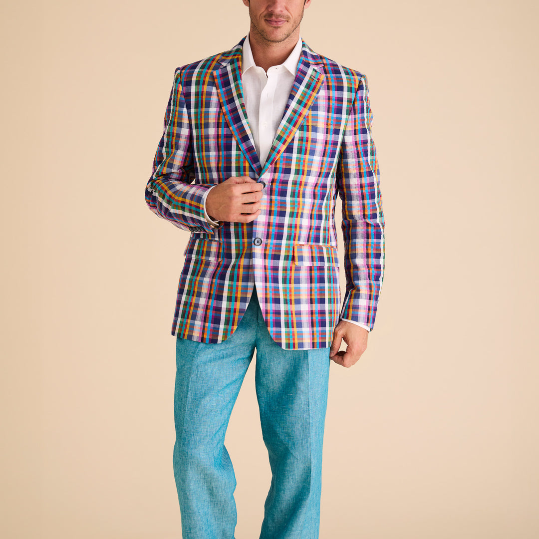 A person is wearing the Inserch Seersucker Madras Check Blazer BL276-00066 Multicolor over a white shirt with light blue pants, standing against a plain background.