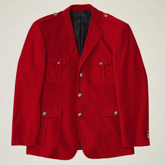 Inserch's Velvet Military Blazer BL569-30 in red combines a sophisticated jacquard pattern with a buttoned front, flap pockets, and shoulder epaulets on a plain background.