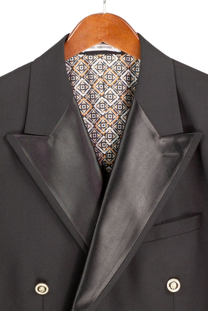 Modern Fit Black Double-Breasted Tuxedo Blazer BM-DB by Vinci Suits with satin lapels, gold buttons, teal shirt, black bow tie, and decorative lapel pin.