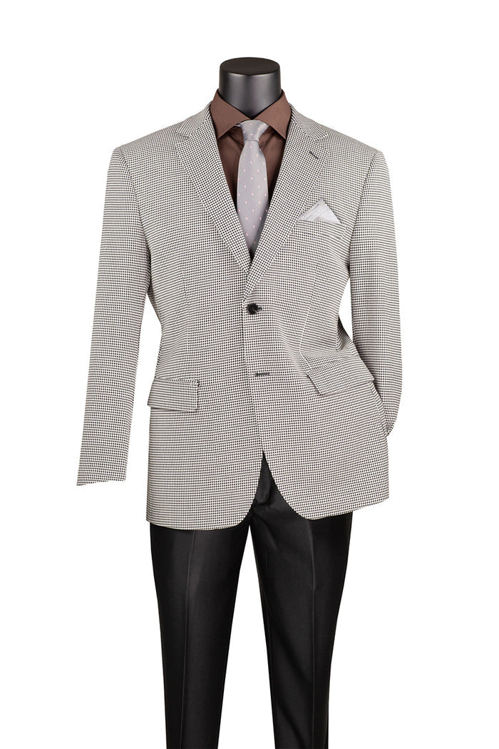 A mannequin in a Vinci Suits' Modern Fit Black BM-HT houndstooth jacket, paired with a brown shirt, silver polka dot tie, and black trousers, exudes elegance with its refined wool feel against an isolated white background.
