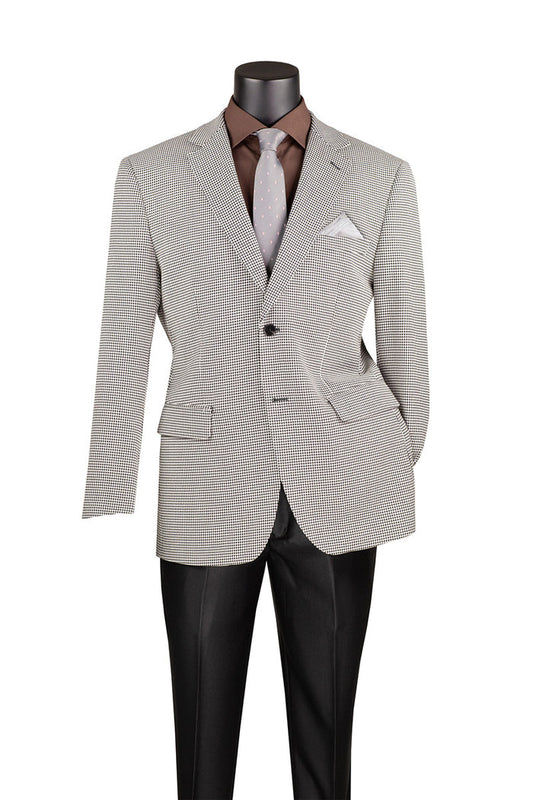A mannequin in a Vinci Suits' Modern Fit Black BM-HT houndstooth jacket, paired with a brown shirt, silver polka dot tie, and black trousers, exudes elegance with its refined wool feel against an isolated white background.