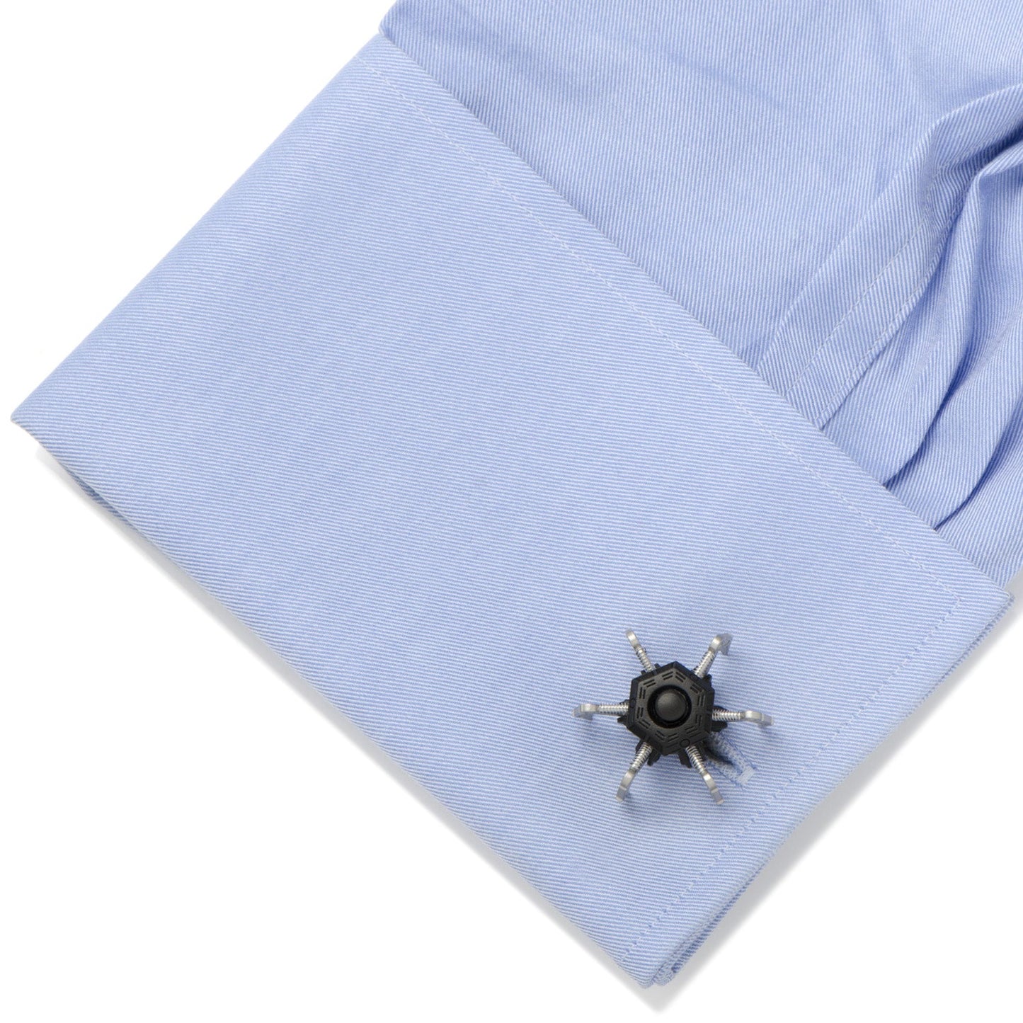 The Drone Cufflinks by Cufflinks.com are designed to resemble small black and silver spider robots with multiple claw-like legs.