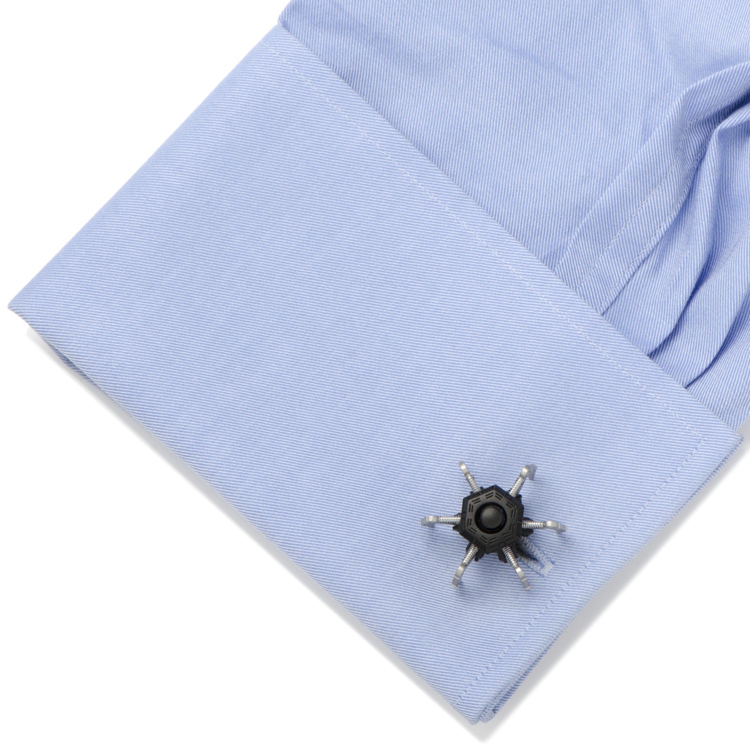 The Drone Cufflinks by Cufflinks.com are designed to resemble small black and silver spider robots with multiple claw-like legs.