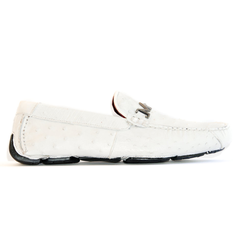 A pair of Bolonia White loafers by Marco Di Milano, featuring metal detailing on the front; one shoe stands upright while the other lies sideways to showcase the black and white sole—expertly crafted luxury moccasins designed to elevate any ensemble.