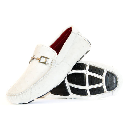 A pair of Bolonia White loafers by Marco Di Milano, featuring metal detailing on the front; one shoe stands upright while the other lies sideways to showcase the black and white sole—expertly crafted luxury moccasins designed to elevate any ensemble.