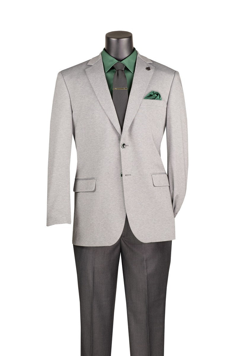 A mannequin showcases the Regular Fit Light Gray Super Stretch Blazer BRK-4 by Vinci Suits with dark gray pants, green shirt, black tie, and green pocket square for comfort and style.
