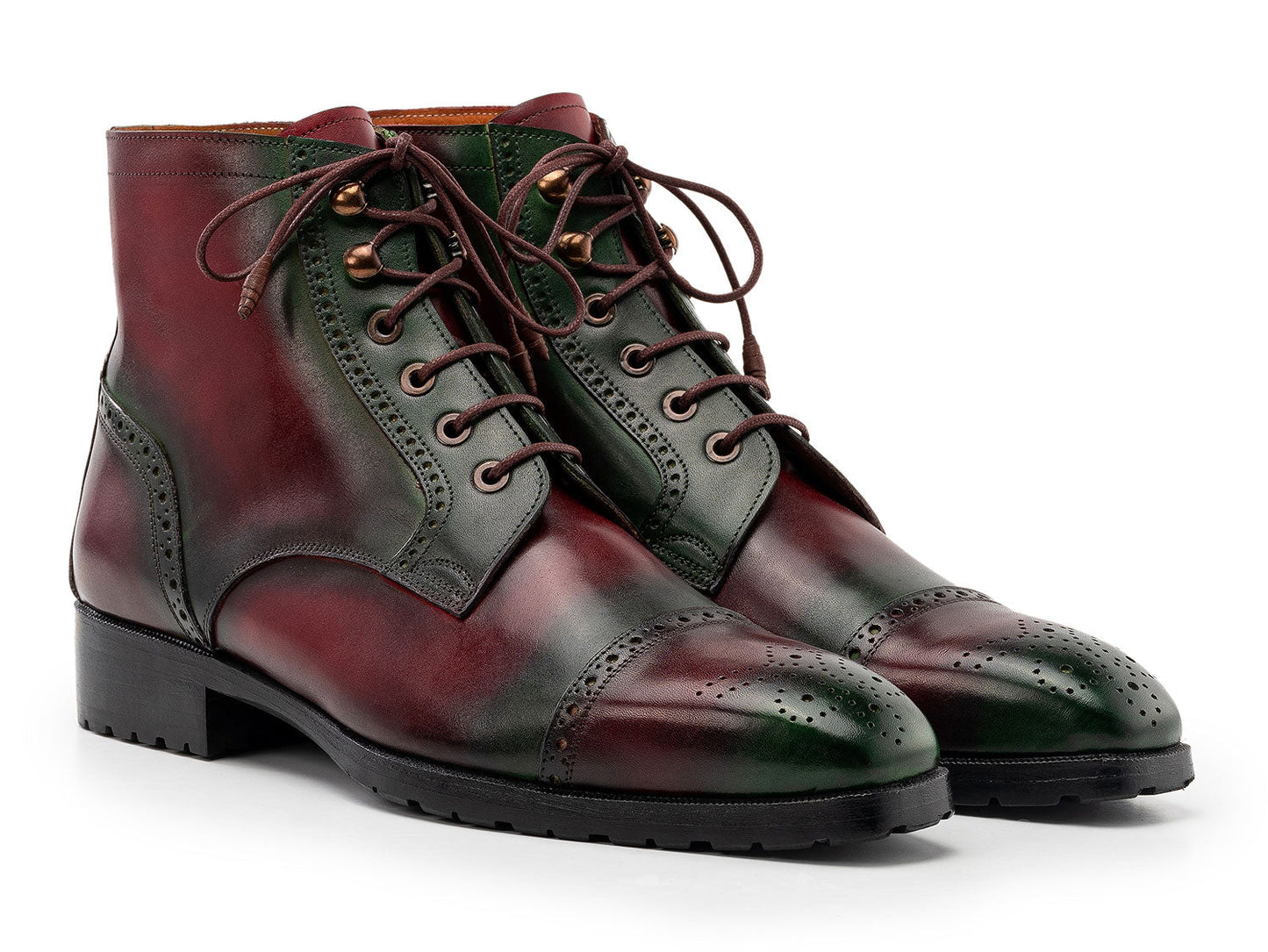 Paul Parkman Green & Brown Hand-Painted Cap Toe Boots (BT9566-BRG) for men, featuring brogue detailing, black soles, and brown laces—one boot upright and the other leaning against it.