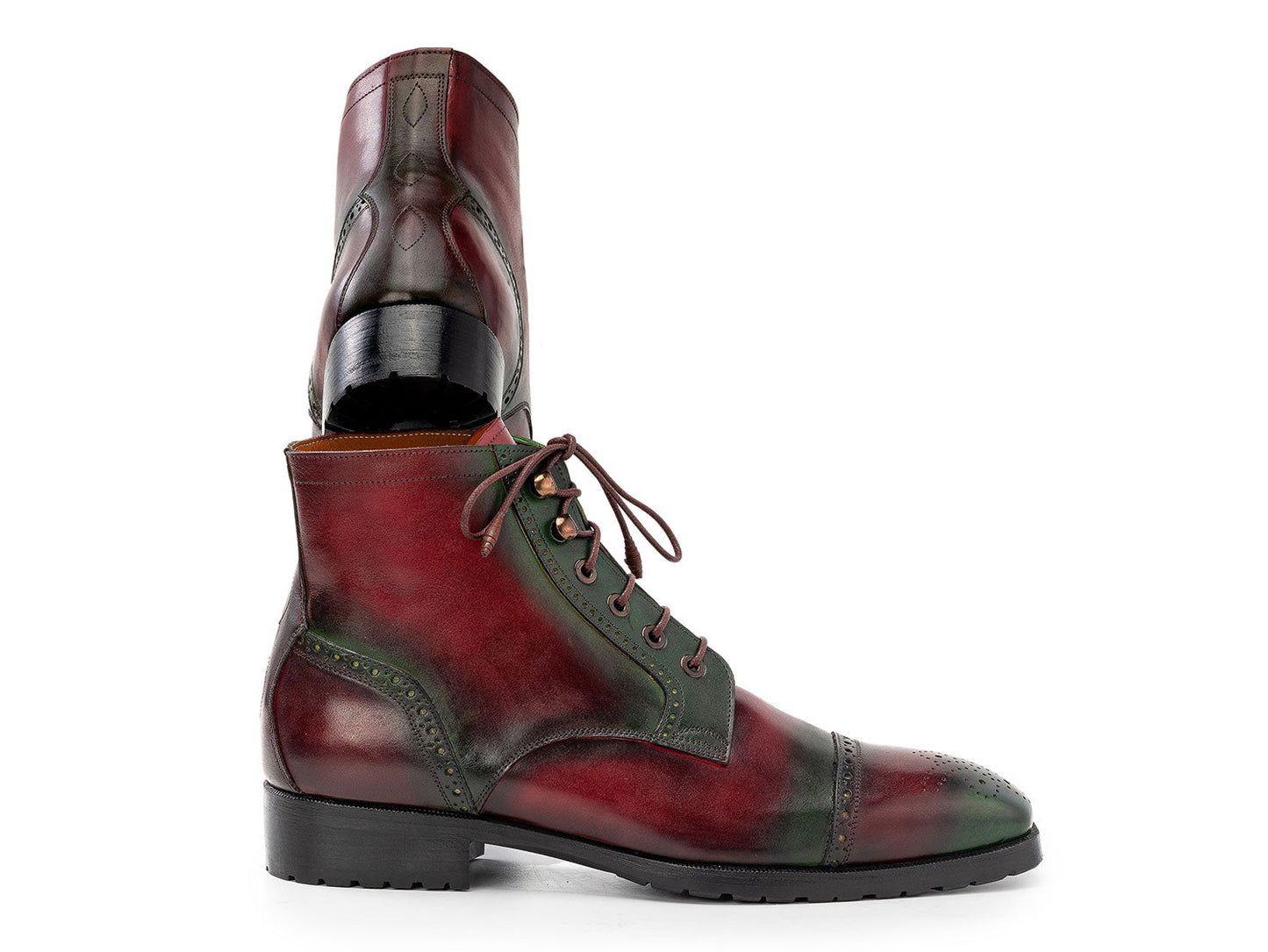 Paul Parkman Green & Brown Hand-Painted Cap Toe Boots (BT9566-BRG) for men, featuring brogue detailing, black soles, and brown laces—one boot upright and the other leaning against it.