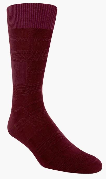 The Stacy Adams Tonal Plaid Burgundy Dress Sock by ORIGINS, featuring a ribbed cuff and a subtle pattern, designed to fit men's sizes 8-13, stands out on a plain background.