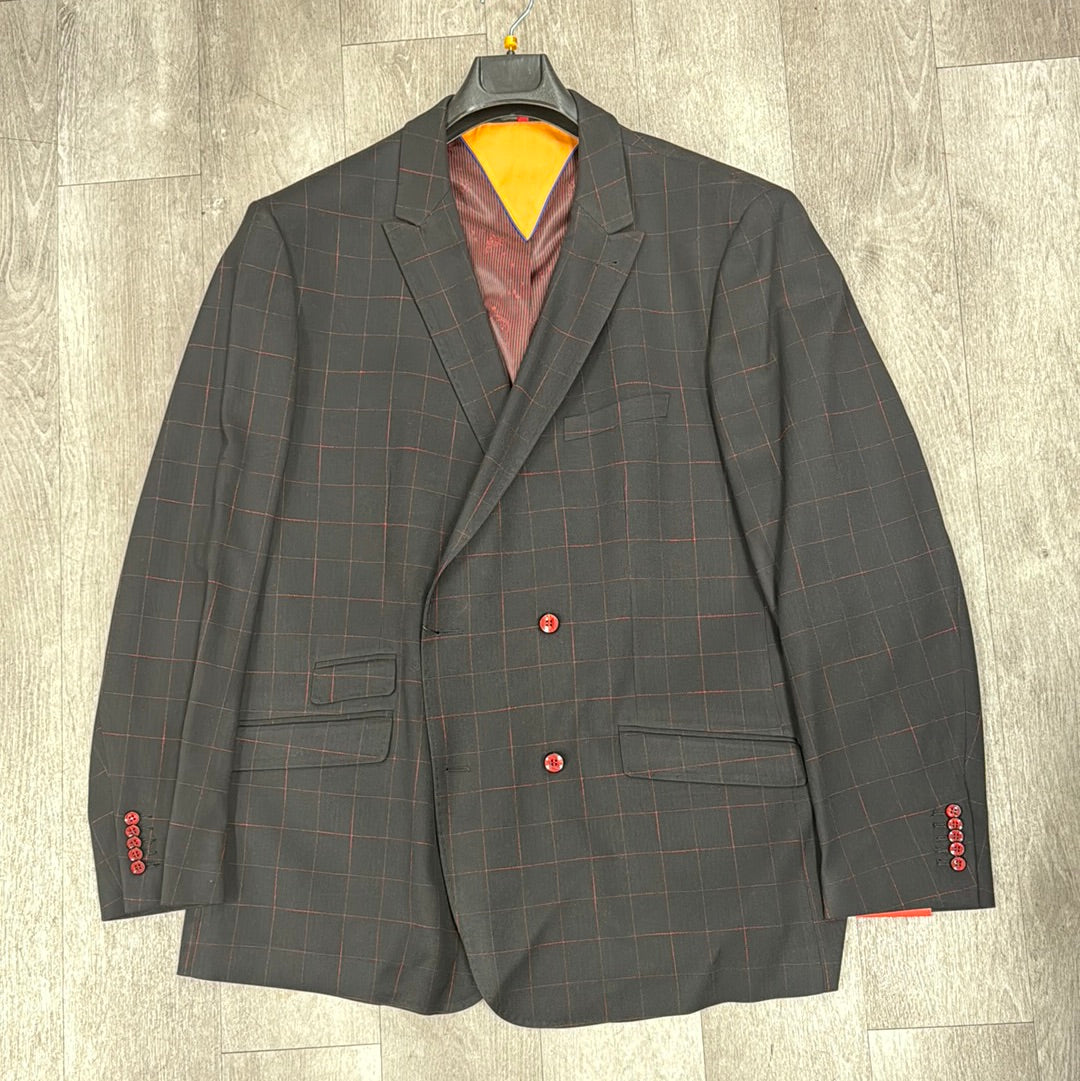 The Inserch Blazer 555-01 Black, exclusively available in size 3XL, features a slim fit design with striking red buttons and a subtle grid pattern, elegantly showcased on a wooden floor.