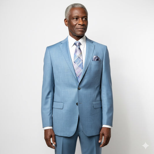 A mannequin dressed in the Tiglio Luxe Dolcetto Modern Fit Teal Suit TL2538, crafted from pure wool and complemented by a patterned tie and pocket square, stands elegantly in front of a gray backdrop.