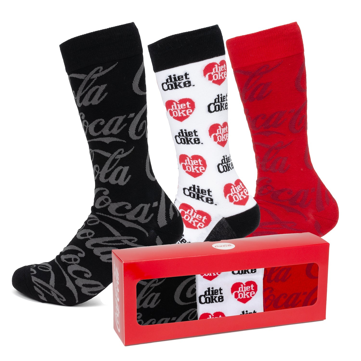 The Coca-Cola 3 Pack Sock Set by Cufflinks.com features three pairs: black with a gray logo, white with Diet Coke branding, and red with the classic Coca-Cola logo.