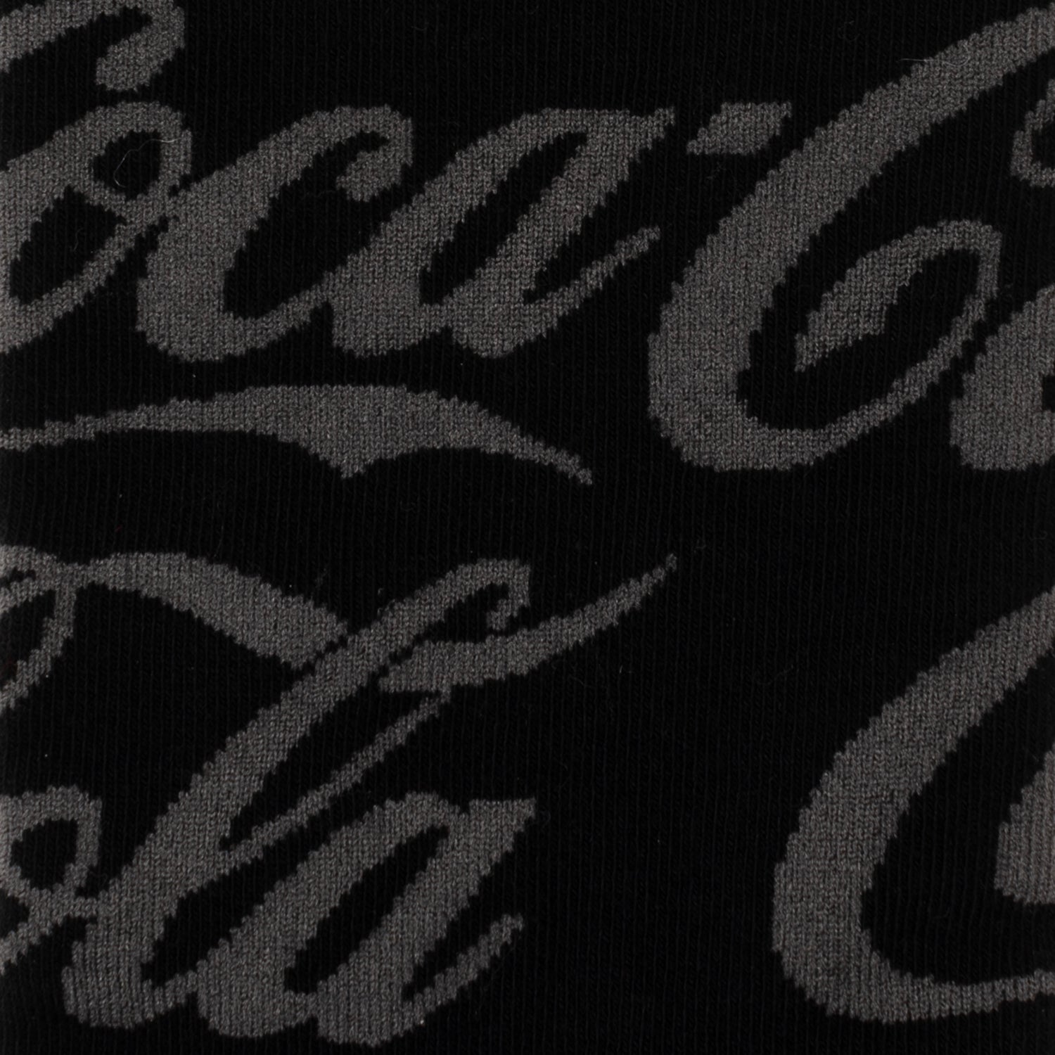 The Coca-Cola 3 Pack Sock Set by Cufflinks.com features three pairs: black with a gray logo, white with Diet Coke branding, and red with the classic Coca-Cola logo.