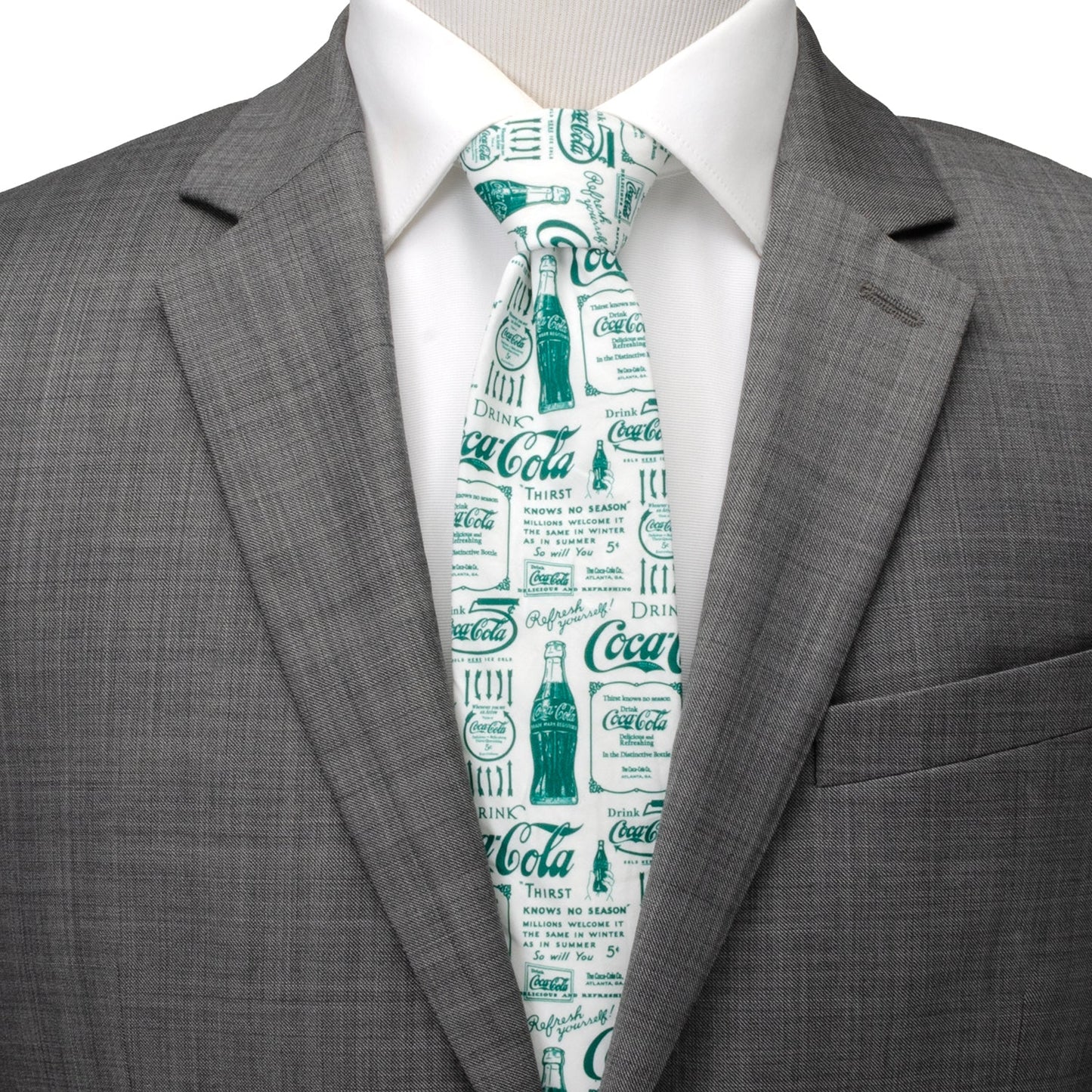 The Coca-Cola Green Bottle Men's Tie by Cufflinks.com features a white retro design with green vintage Coca-Cola ads and bottle illustrations printed across the fabric.