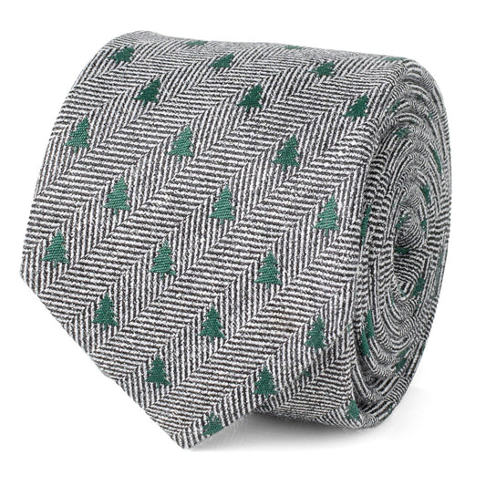 The Holiday Tree Herringbone Tie by Cufflinks.com features a black and white herringbone pattern adorned with small green tree motifs for a subtle, stylish look.