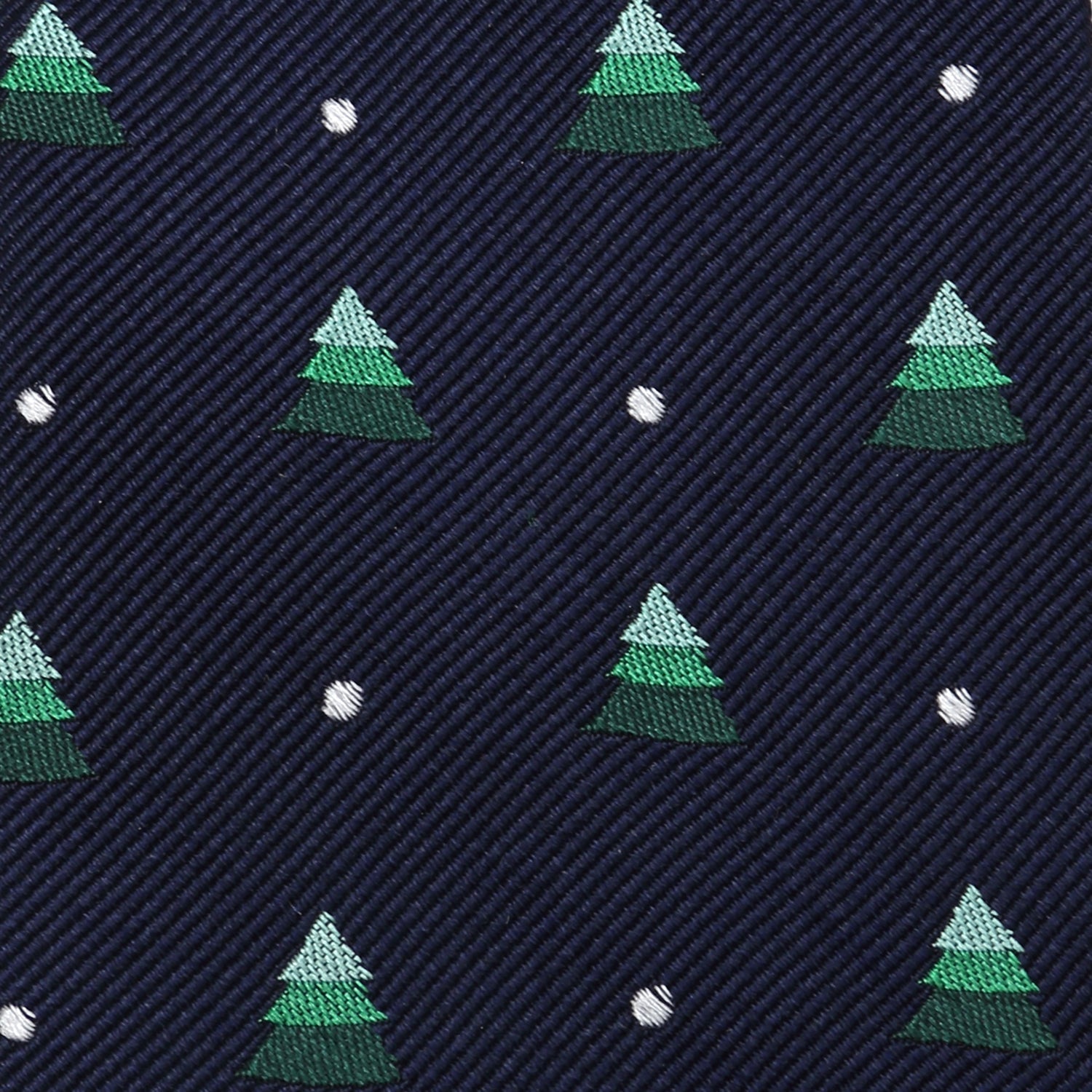 The Holiday Tree Tie and Sock Gift Set by Cufflinks.com includes a navy silk tie and matching socks with green Christmas trees, white dots, and festive red accents—making it a perfect holiday gift.