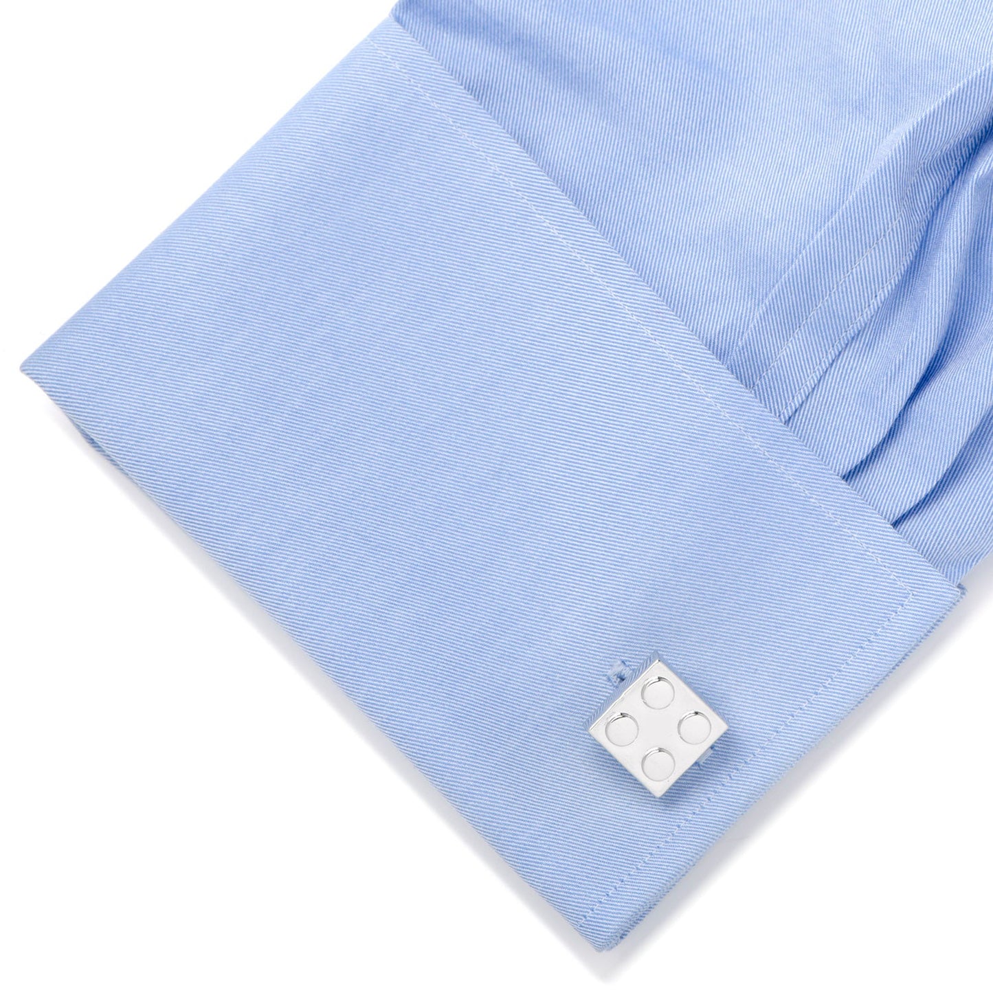Silver Building Block Cufflinks by Cufflinks.com feature four raised circular studs on each front, creating a playful building block design.