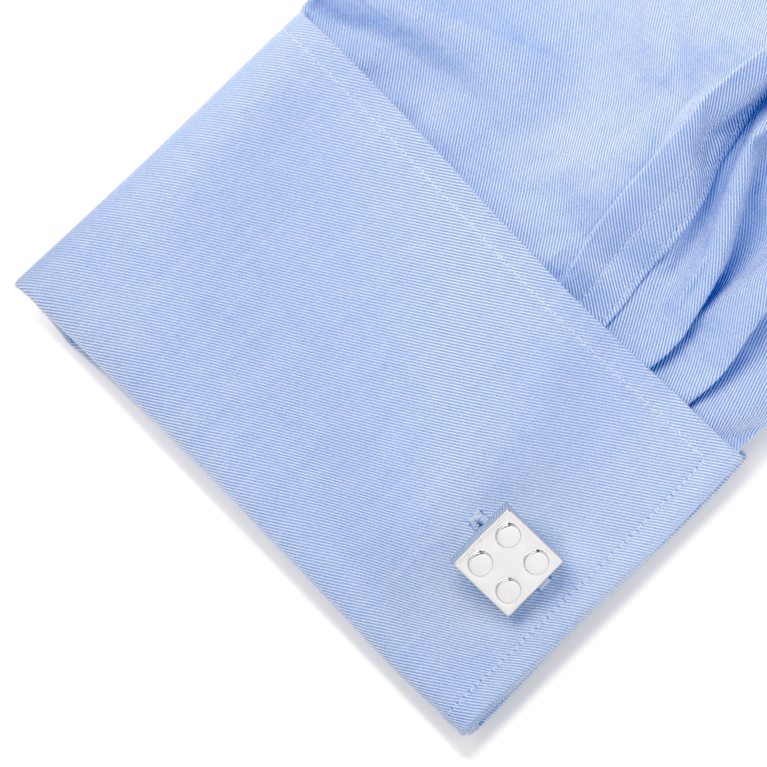 Silver Building Block Cufflinks by Cufflinks.com feature four raised circular studs on each front, creating a playful building block design.