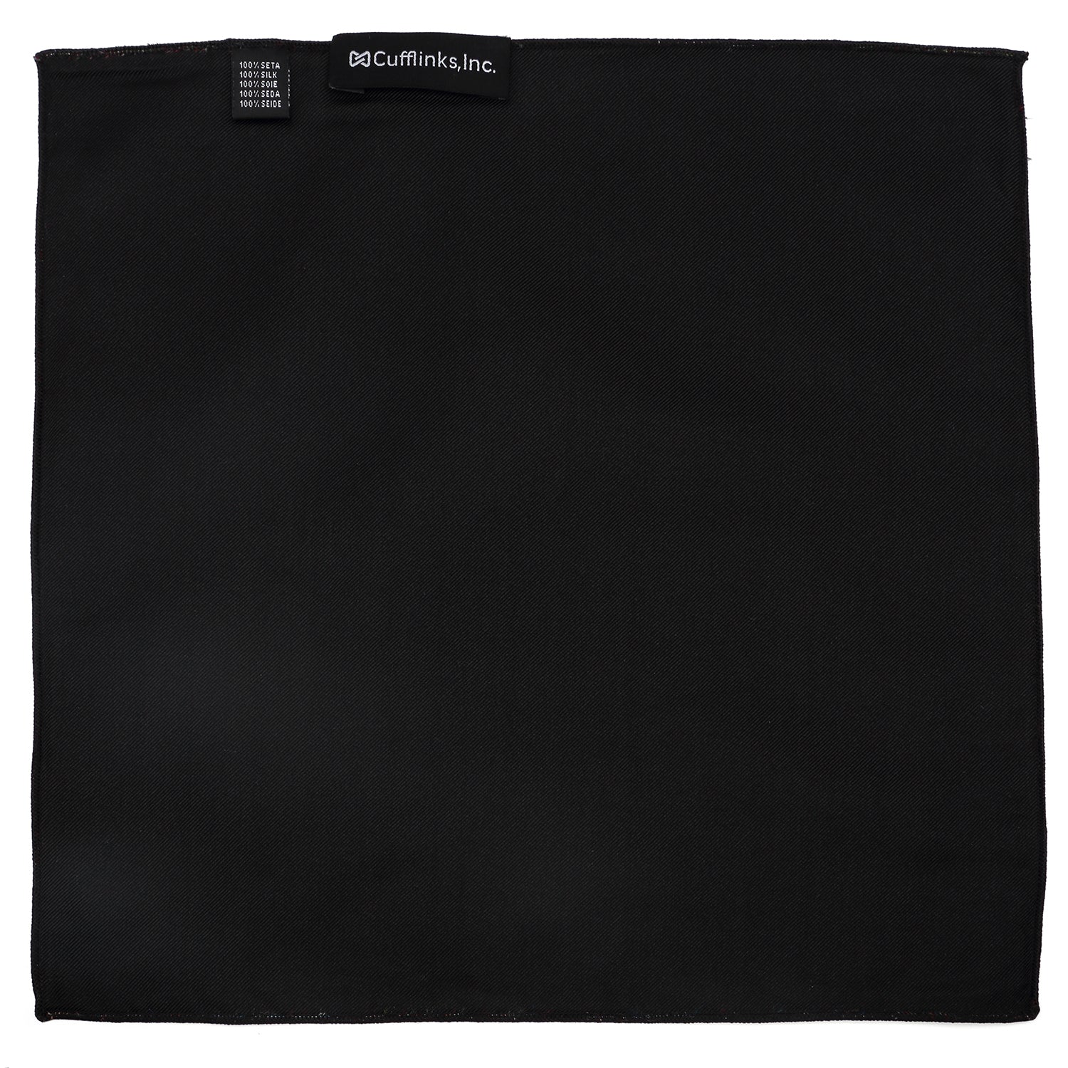 The Sugar Skull Pocket Square by Cufflinks.com features a dark red fabric with white skulls and red roses—perfect as a Day of the Dead or calavera accessory.