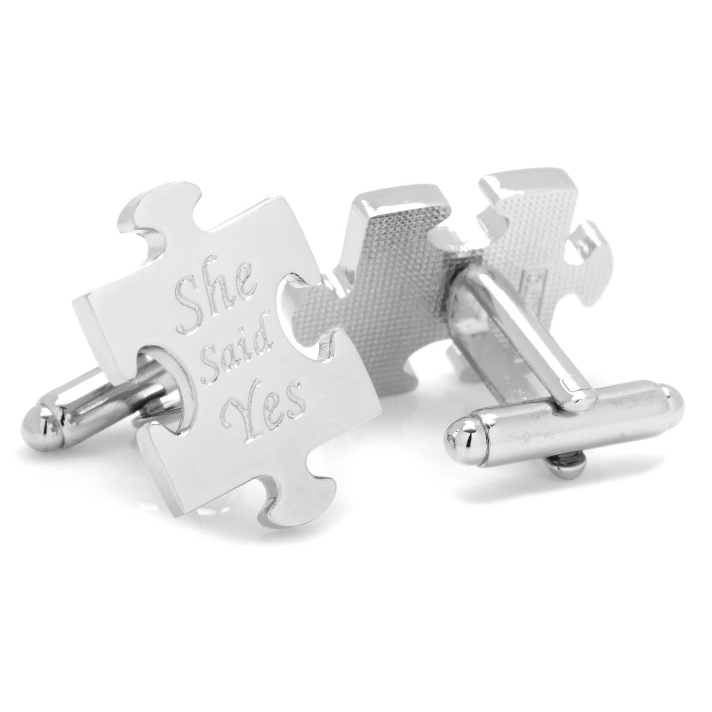 Celebrate your special day with the Wedding Puzzle Pieces Cufflinks Pair from Cufflinks.com—two silver cufflinks shaped like interlocking puzzle pieces, engraved with "She said Yes" and "I DO.