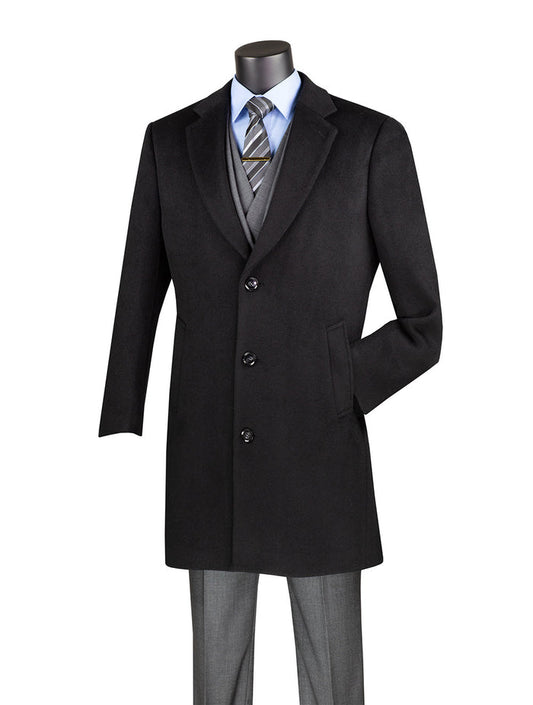 A mannequin elegantly showcases the Vinci Suits Wool & Cashmere Regular Fit Top Coat 38" Long in Black CL38, draped over a gray suit. A crisp blue shirt and striped tie complete the ensemble, capturing timeless sophistication and regular fit elegance.