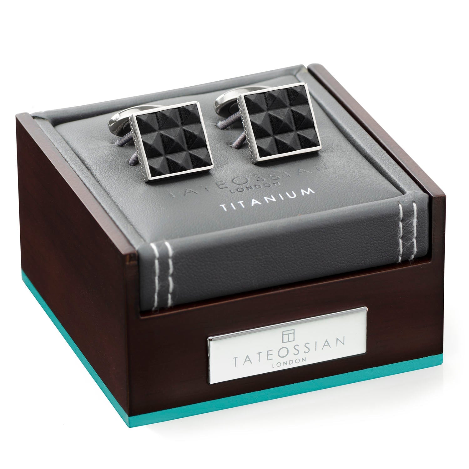 The Pyramids Leather and Titanium Cufflinks by Cufflinks.com feature a silver border and black pyramid-patterned face—ideal for adding timeless elegance to any formal outfit.