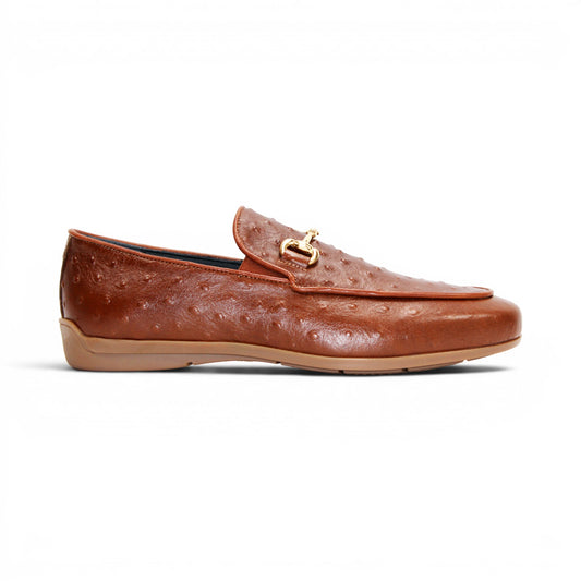 Duca Di Matiste's Duca Cortona Cuoio is a brown leather loafer featuring a gold metal bit detail and Stampa Struzzo ostrich-textured pattern, presented in a side profile against a white background—a refined showcase of luxury Italian footwear.