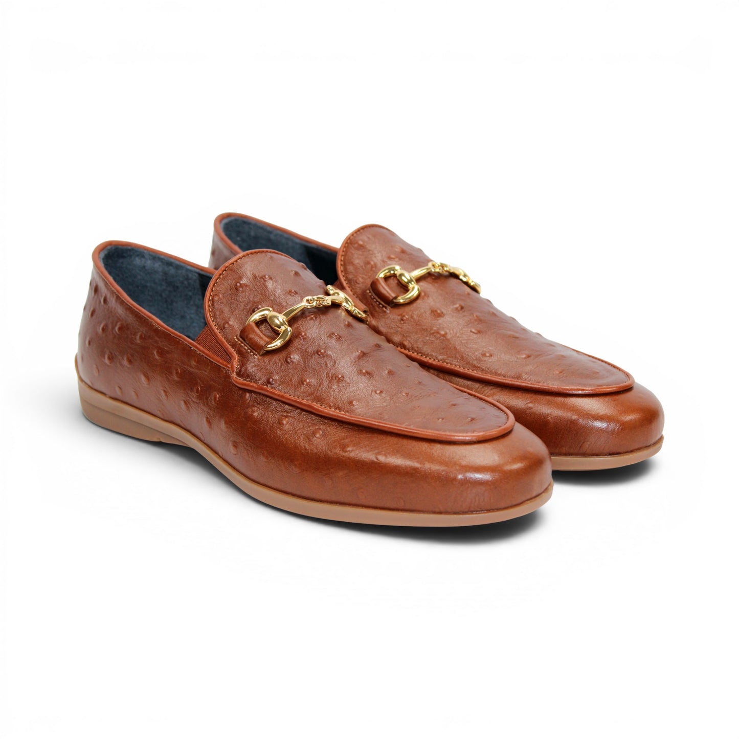 Duca Di Matiste's Duca Cortona Cuoio is a brown leather loafer featuring a gold metal bit detail and Stampa Struzzo ostrich-textured pattern, presented in a side profile against a white background—a refined showcase of luxury Italian footwear.