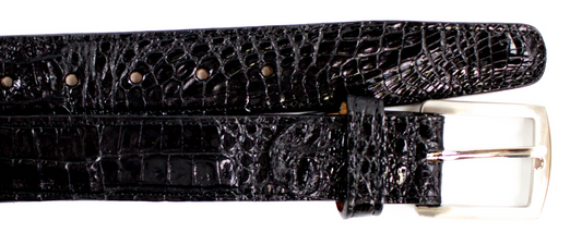 The BELVEDERE Caiman Belt Black 1999 features black leather with a Caiman Crocodilus texture and a silver buckle, shown against a white background for a stylish look.
