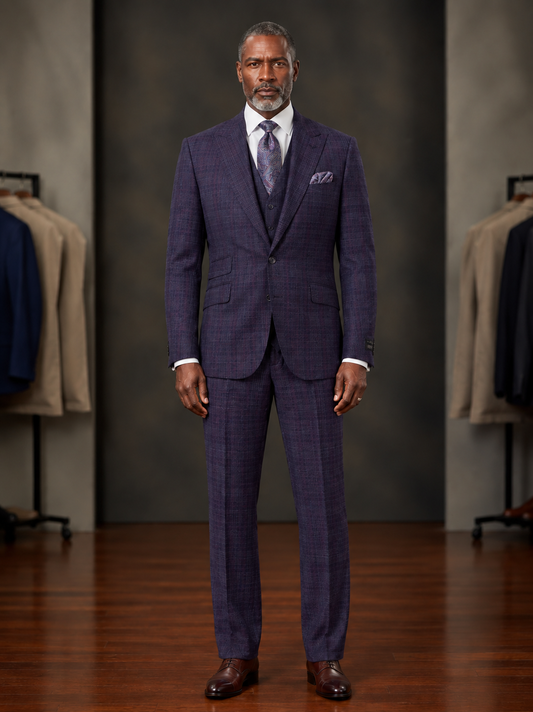 The Tiglio Rosso Orvietto Purple Checkered Semi Wide Leg TL7548 suit by Tiglio Rosso features a dark purple plaid single-breasted jacket with two front pockets and matching semi wide leg trousers, displayed on a white background.